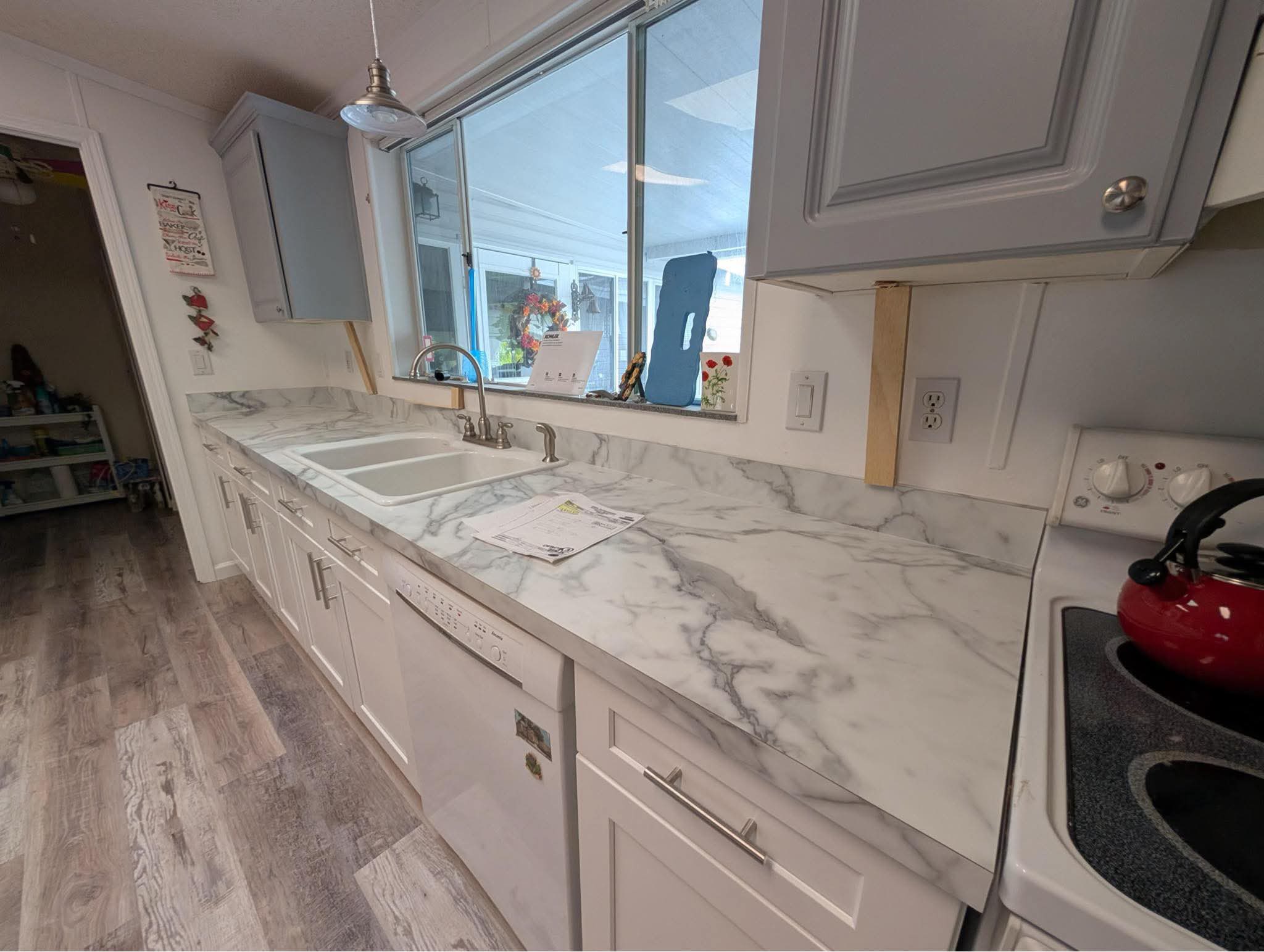 Completed light marble-look laminate countertop